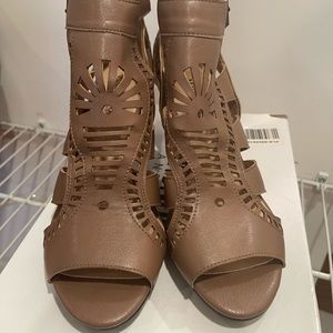 Brand new in the box Brown high heel open toe summer shoes. Size 8